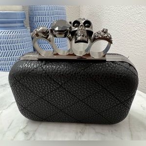 Edgy and fun brass knuckle clutch!